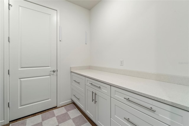 interior space with tile patterned floors