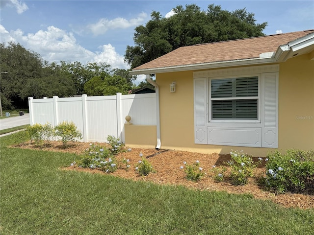 333 Crystal Cir, Oviedo, FL 32765 - view of property exterior featuring stucco siding and roof with shingles