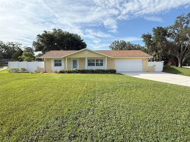333 Crystal Cir, Oviedo, FL 32765 - ranch-style home featuring an attached garage, concrete driveway, and stucco siding