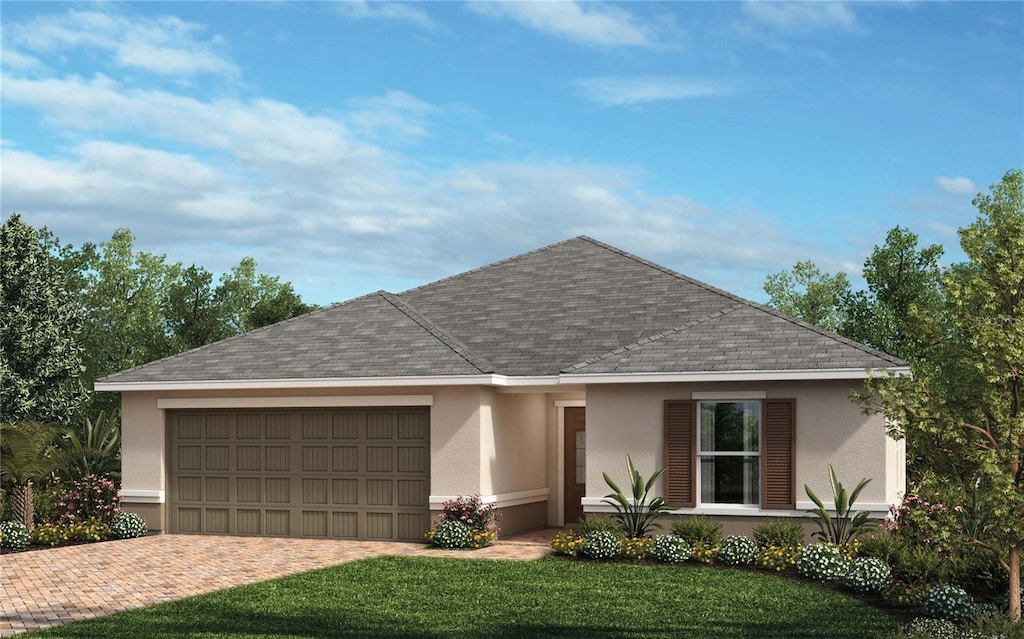 ranch-style house featuring stucco siding, decorative driveway, roof with shingles, and an attached garage