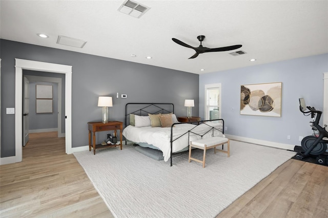 bedroom with visible vents, recessed lighting, baseboards, and light wood-style floors