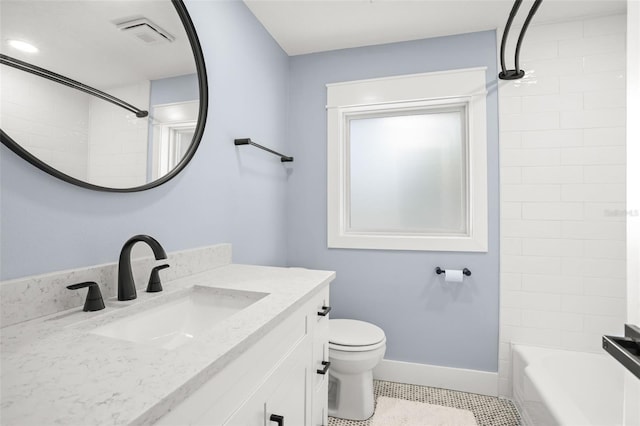 bathroom with visible vents, toilet, tile patterned flooring, baseboards, and vanity