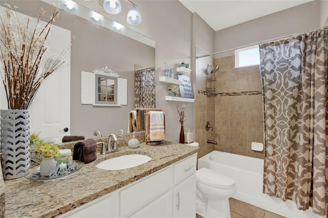 full bathroom featuring tile patterned flooring, toilet, shower / bath combo with shower curtain, and vanity