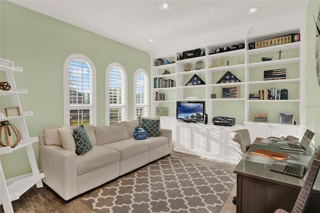 home office with dark wood-style floors and recessed lighting