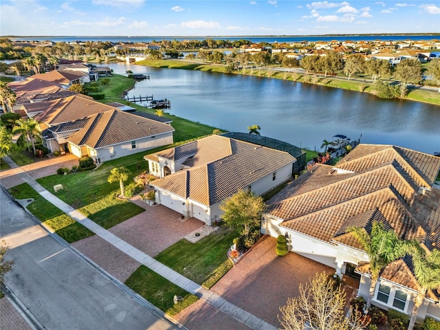 aerial view with a residential view and a water view