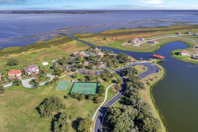 birds eye view of property featuring a water view