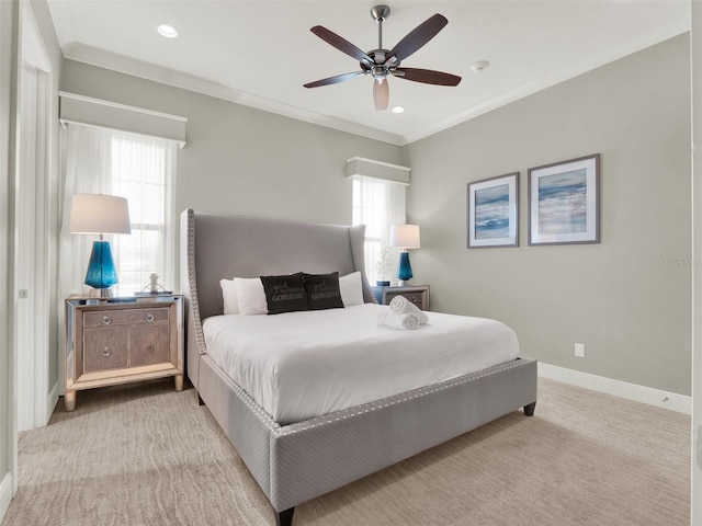 bedroom featuring multiple windows, baseboards, carpet floors, and ornamental molding