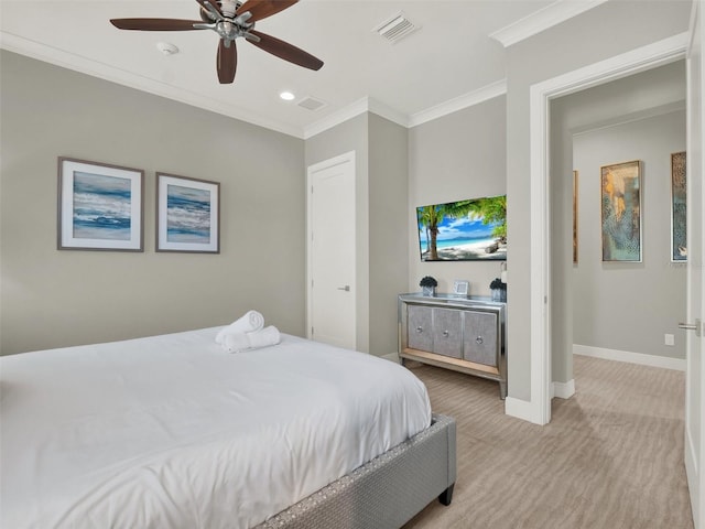 bedroom with a ceiling fan, baseboards, visible vents, and ornamental molding