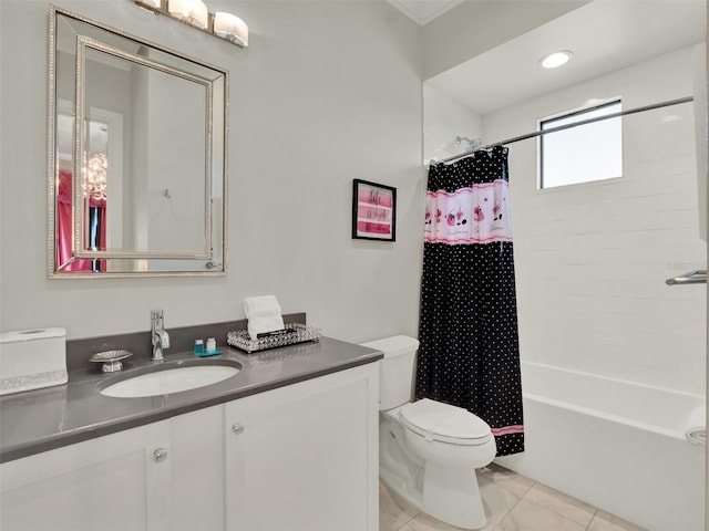 full bathroom featuring toilet, shower / bath combo, vanity, and tile patterned flooring