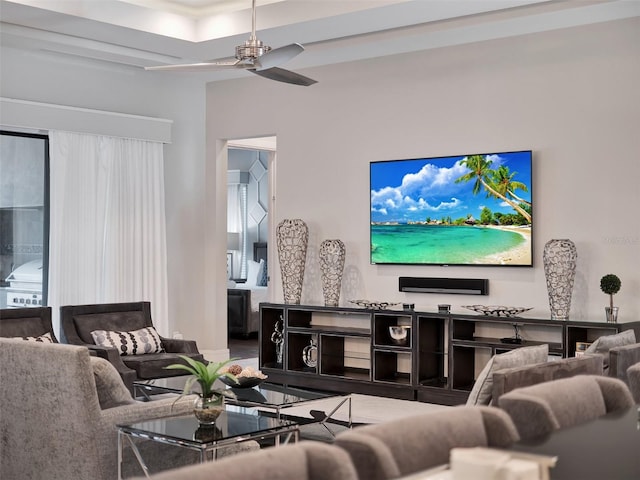 living area with ceiling fan