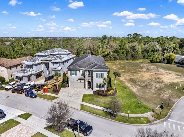 bird's eye view featuring a wooded view