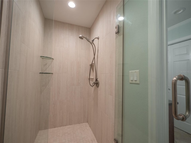 full bath with a shower stall