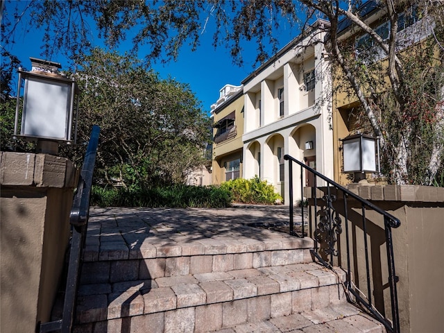 view of property with stairs