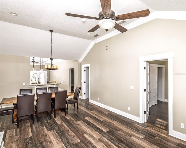 dining space with baseboards, lofted ceiling, and dark wood-style flooring