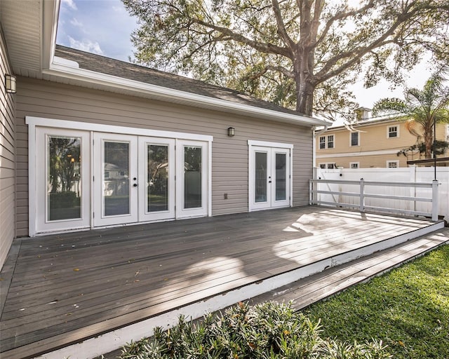 wooden terrace with french doors and fence