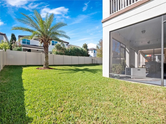 view of yard with fence