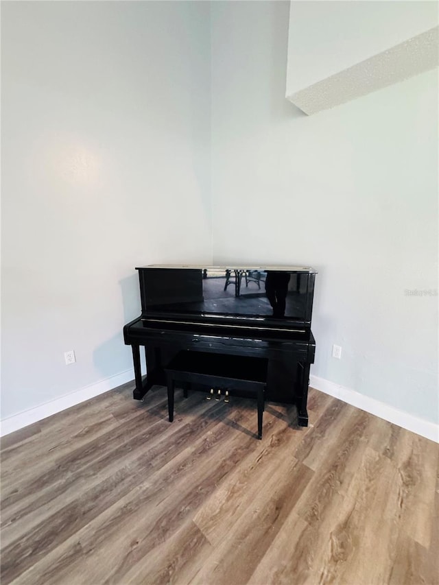 4100 Player Cir Unit 101, Orlando, FL 32808 - living area featuring baseboards and wood finished floors