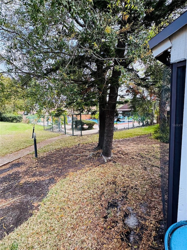 4100 Player Cir Unit 101, Orlando, FL 32808 - view of yard with fence