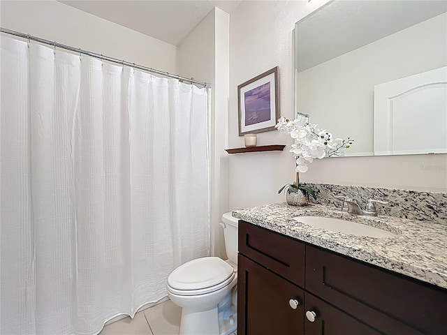 3279 Landing Vw, Tavares, FL 32778 - bathroom with tile patterned floors, vanity, and toilet
