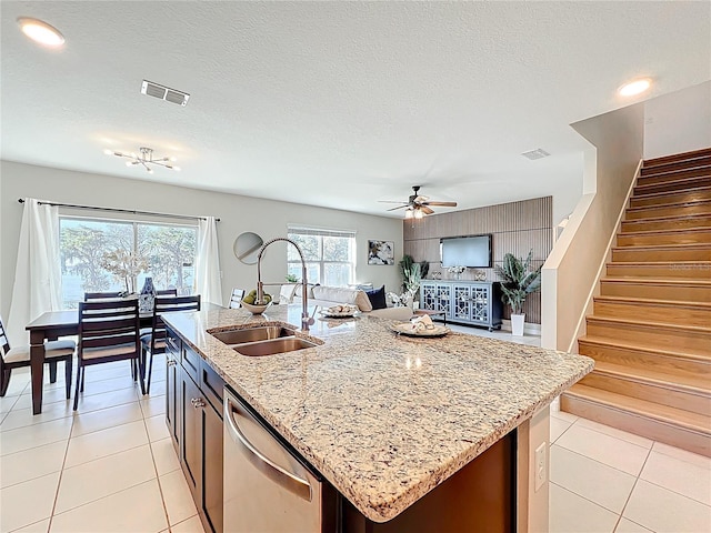 3279 Landing Vw, Tavares, FL 32778 - kitchen with visible vents, dishwasher, a sink, open floor plan, and a ceiling fan