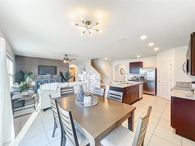 3279 Landing Vw, Tavares, FL 32778 - dining room with light tile patterned floors, ceiling fan, arched walkways, visible vents, and recessed lighting