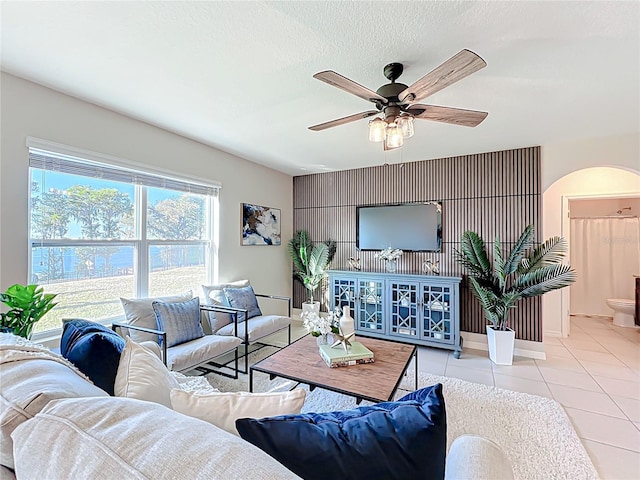 3279 Landing Vw, Tavares, FL 32778 - living room featuring tile patterned floors and a ceiling fan