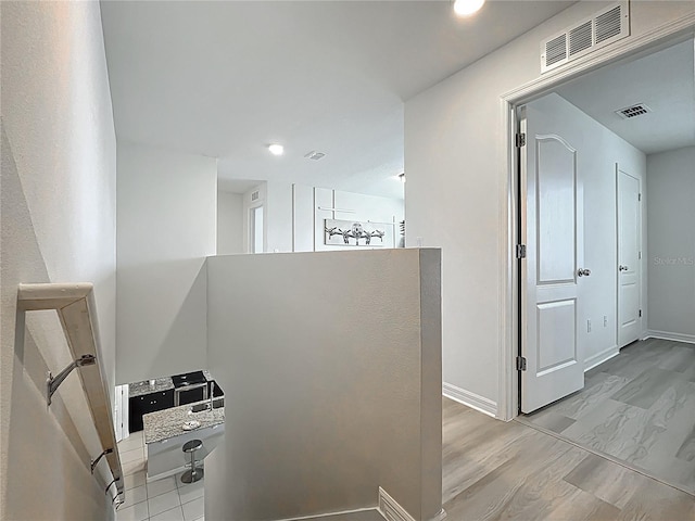 3279 Landing Vw, Tavares, FL 32778 - corridor with recessed lighting, light wood finished floors, visible vents, and baseboards