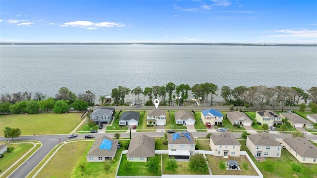 3279 Landing Vw, Tavares, FL 32778 - bird's eye view featuring a water view and a residential view