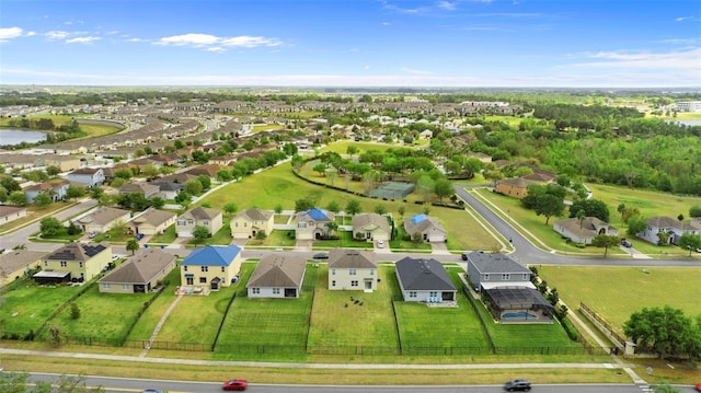 3279 Landing Vw, Tavares, FL 32778 - drone / aerial view featuring a water view and a residential view
