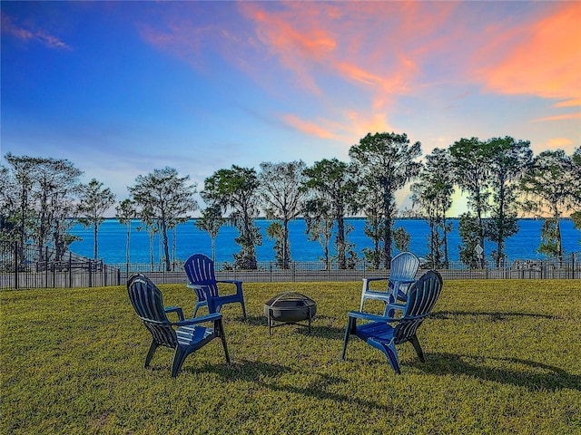 3279 Landing Vw, Tavares, FL 32778 - exterior space with a lawn, fence, and a water view
