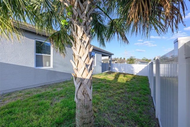 view of yard featuring a fenced backyard