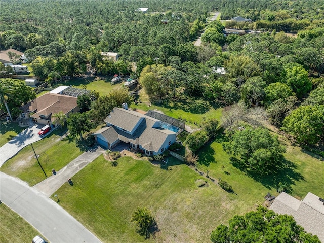 aerial view with a wooded view