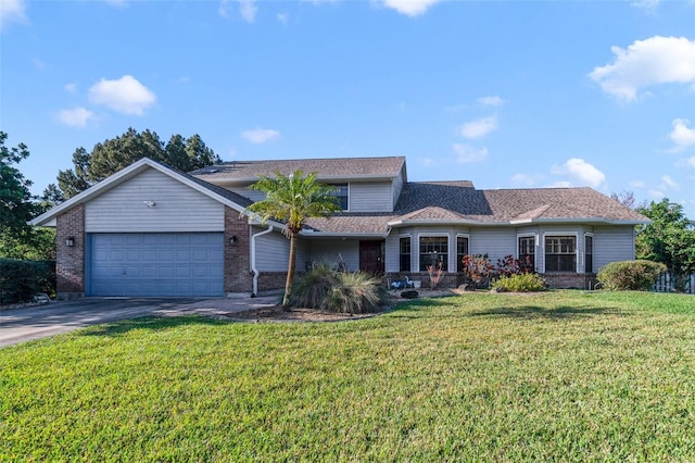 traditional home featuring a garage, brick siding, concrete driveway, and a front lawn