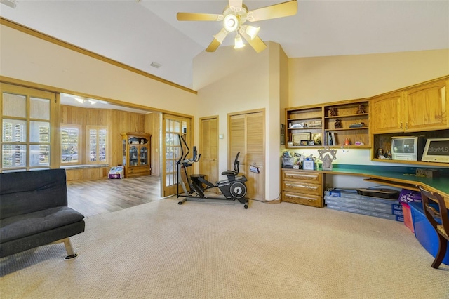 workout area featuring high vaulted ceiling, carpet, visible vents, and ceiling fan