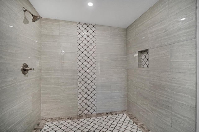 bathroom featuring tiled shower