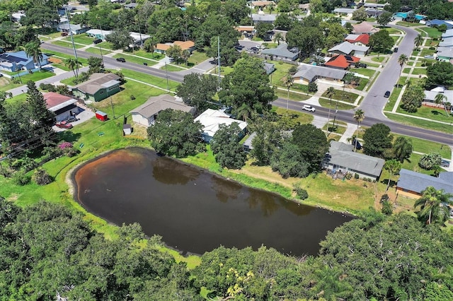 birds eye view of property featuring a residential view and a water view