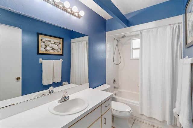 full bath with tile patterned flooring, vanity, toilet, and shower / tub combo