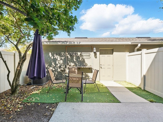 view of patio / terrace with fence