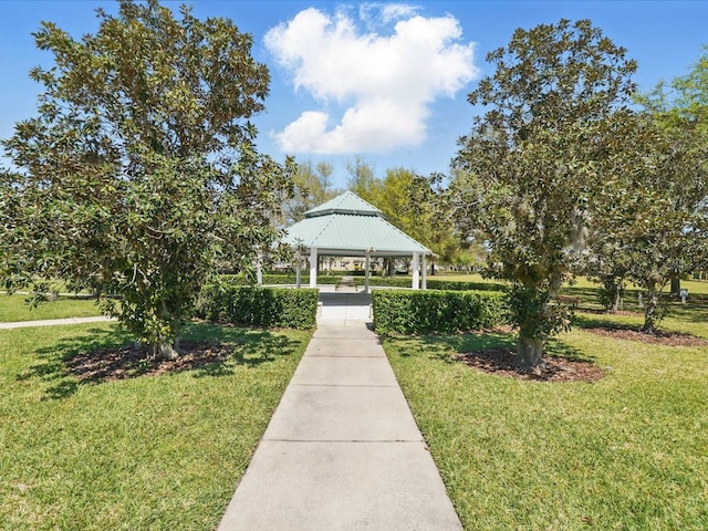 view of home's community with a gazebo and a lawn