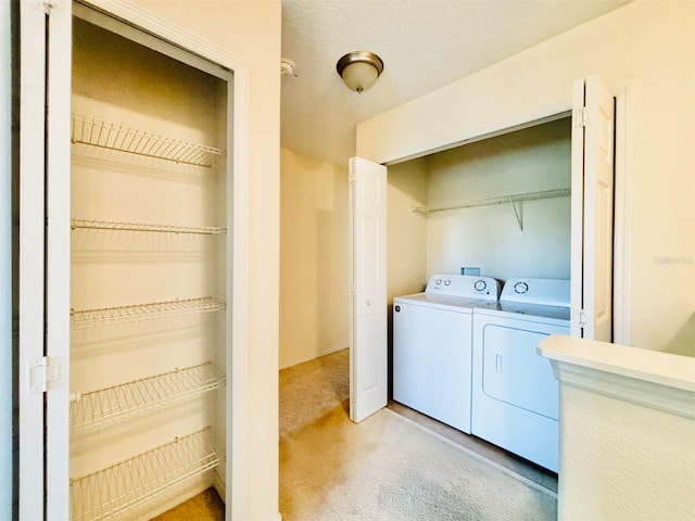 laundry area featuring laundry area and washer and dryer