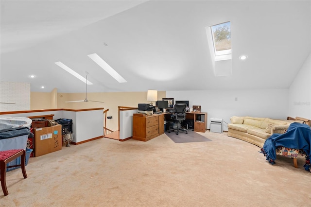 office space with light carpet, recessed lighting, and vaulted ceiling with skylight