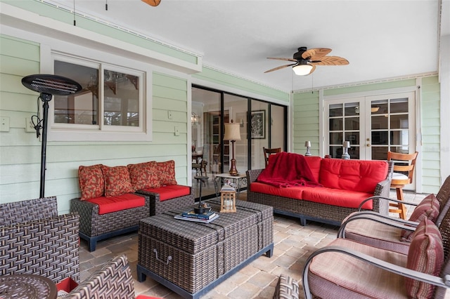 exterior space featuring a ceiling fan, a patio area, french doors, and an outdoor living space