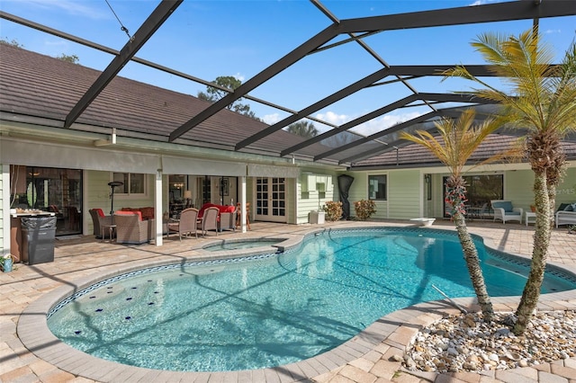 outdoor pool with a patio, an in ground hot tub, french doors, outdoor lounge area, and a lanai