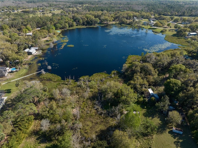 aerial view with a view of trees and a water view