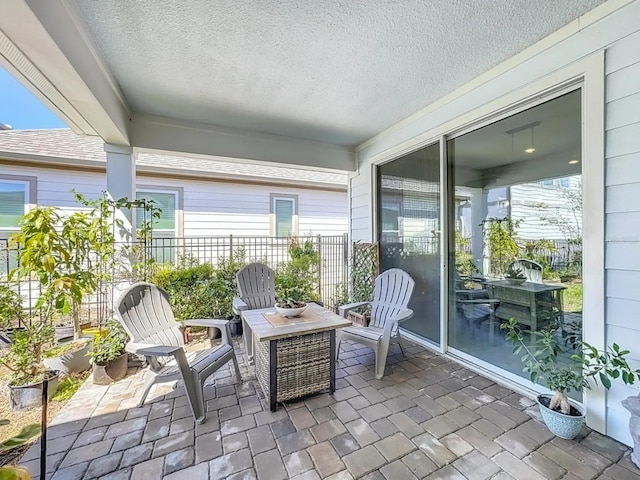 view of patio with fence