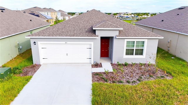 ranch-style house featuring concrete driveway, stucco siding, a garage, and a shingled roof