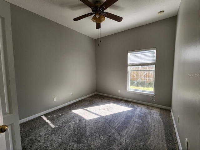 unfurnished room with ceiling fan, carpet, and baseboards