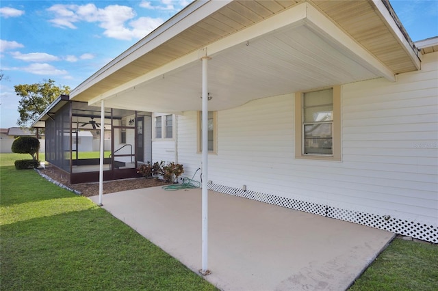 view of patio / terrace with a sunroom