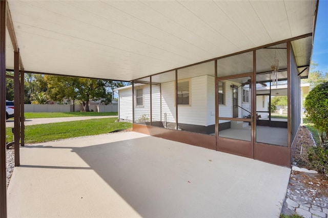 view of patio / terrace with a sunroom