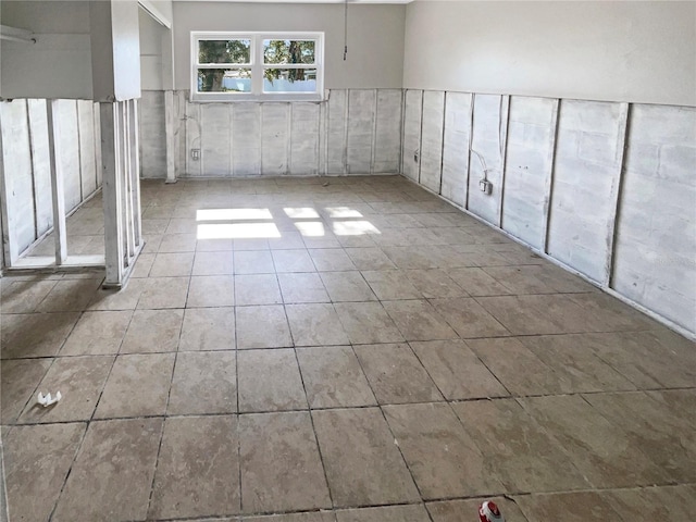 spare room with tile patterned floors